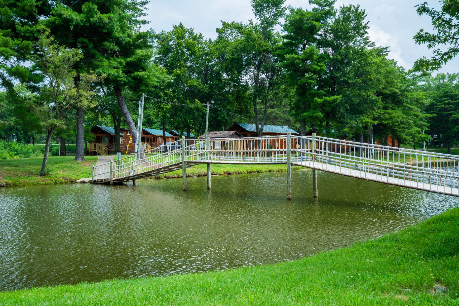 Bridge over the pond by the cabins at Diamond Lake Resort